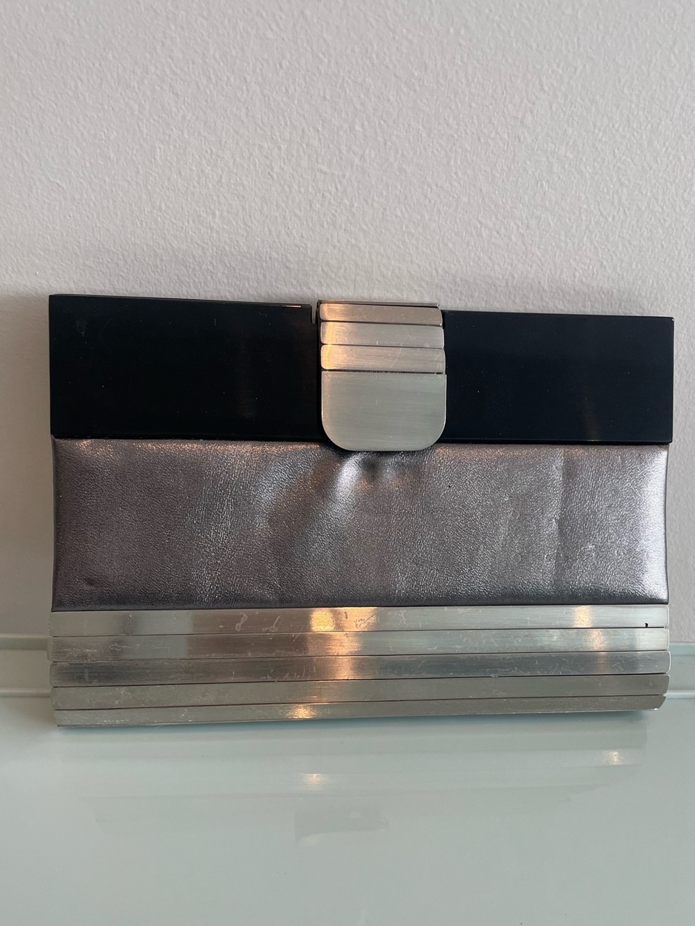 Sondra Roberts Black Handbag with Silver Plaque